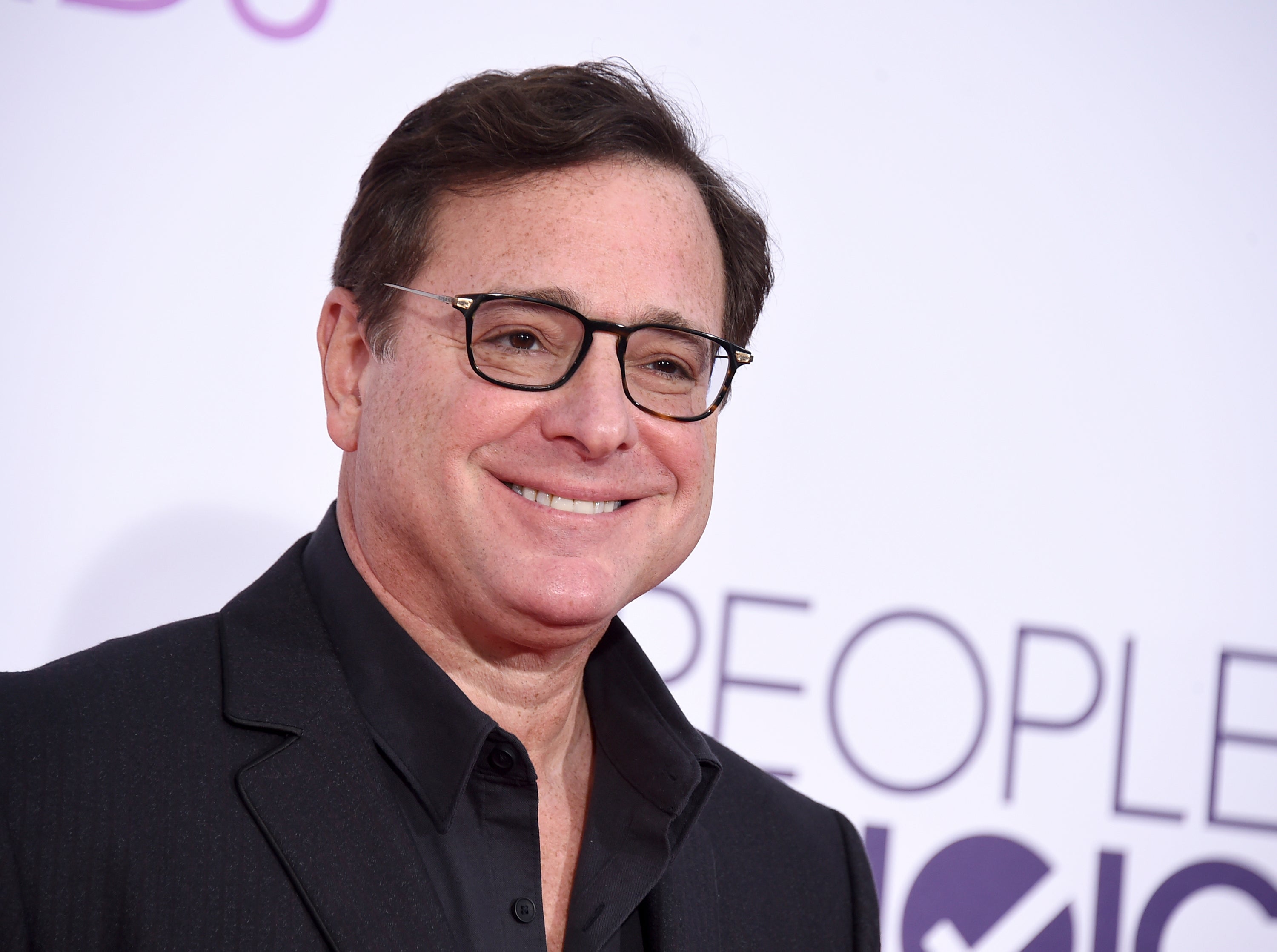 The cast of Full House said they will ‘grieve as a family’ following the death of Bob Saget (Jordan Strauss/AP)