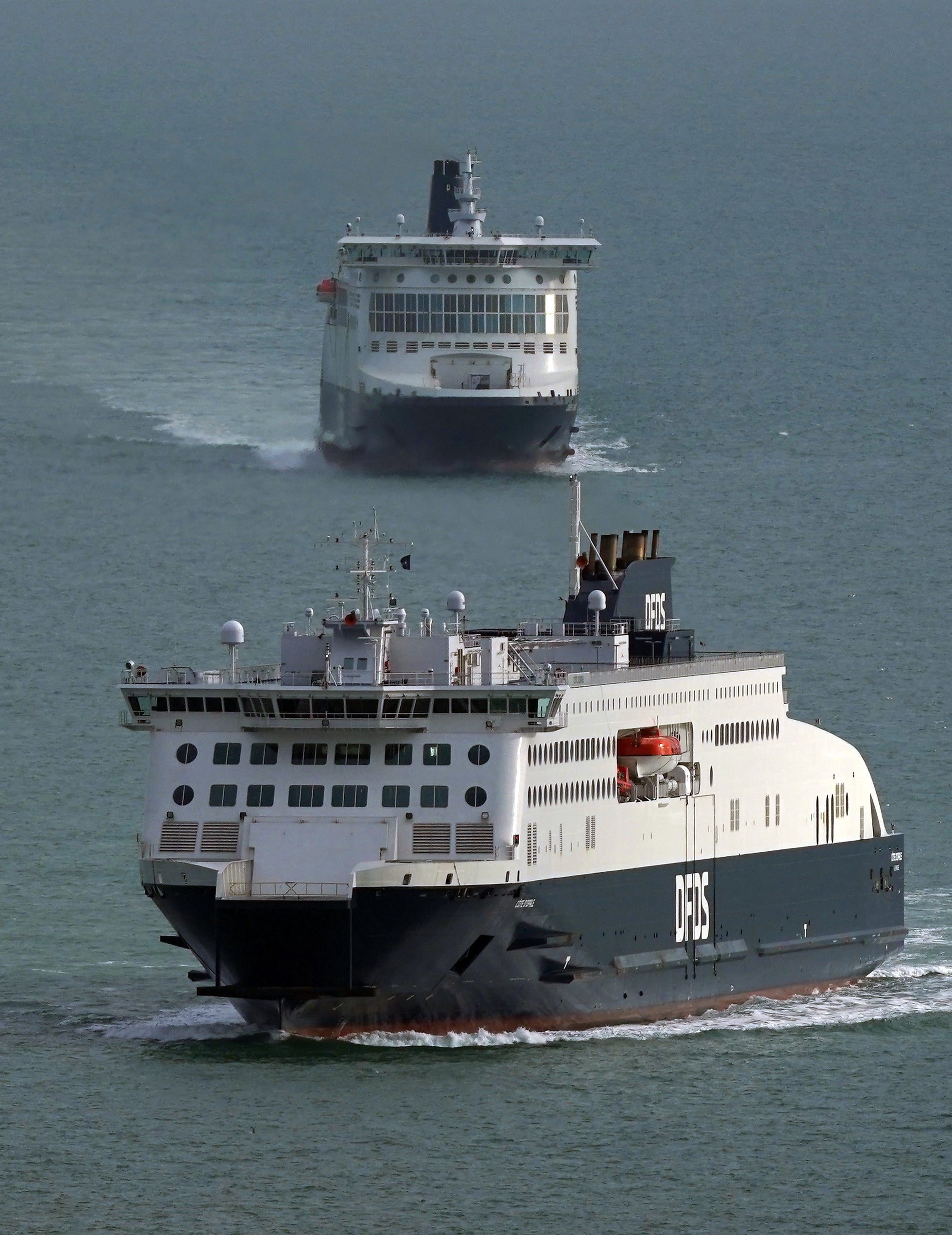 DFDS ferries Dover Seaways (top) and the Cote d’Opale arrive at the Port of Dover in Kent (Gareth Fuller/PA)