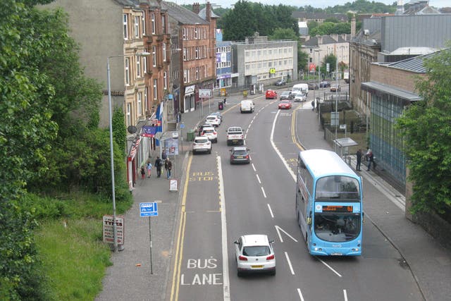 <p>Maryhill Road in Glasgow where life expectancy is more than a decade shorter than in the prosperous suburbs a mile away</p>