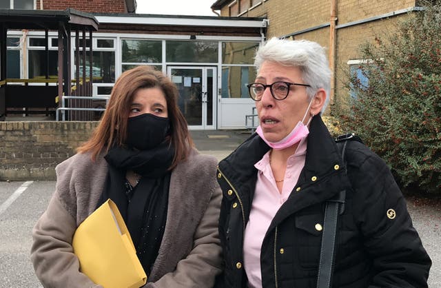 Nevres Kemal (right) speaks to the media after the inquest into the death of her daughter Azra concluded in Maidstone (PA)