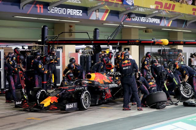 <p>Red Bull's Dutch driver Max Verstappen changes tyres in the pits of the Yas Marina Circuit</p>