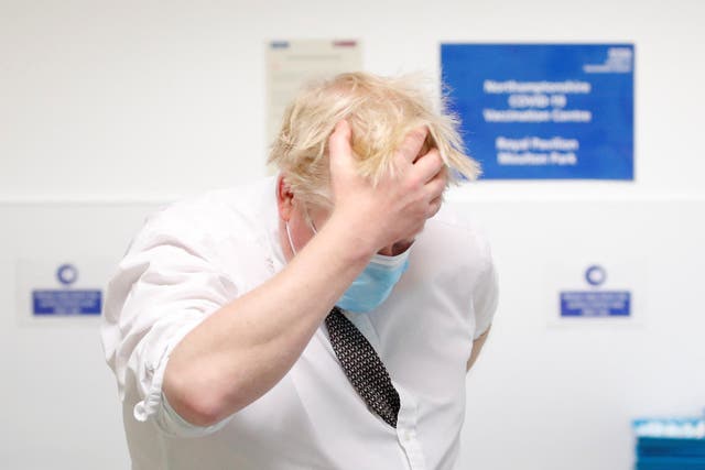 Prime Minister Boris Johnson is coming under pressure to quit over allegations he attended a coronavirus lockdown-busting “bring your own booze” party in the Downing Street garden (Peter Cziborra/Reuters/Pool)