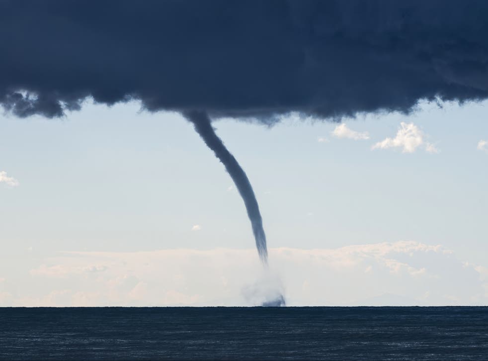 <p>A tornado over the Mediterranean Sea. The climate crisis is warming oceans, making extreme weather more likely</p>