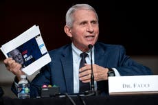 Fauci news - live: Doctor explains calling Roger Marshall ‘moron’ on hot mic over financial disclosure