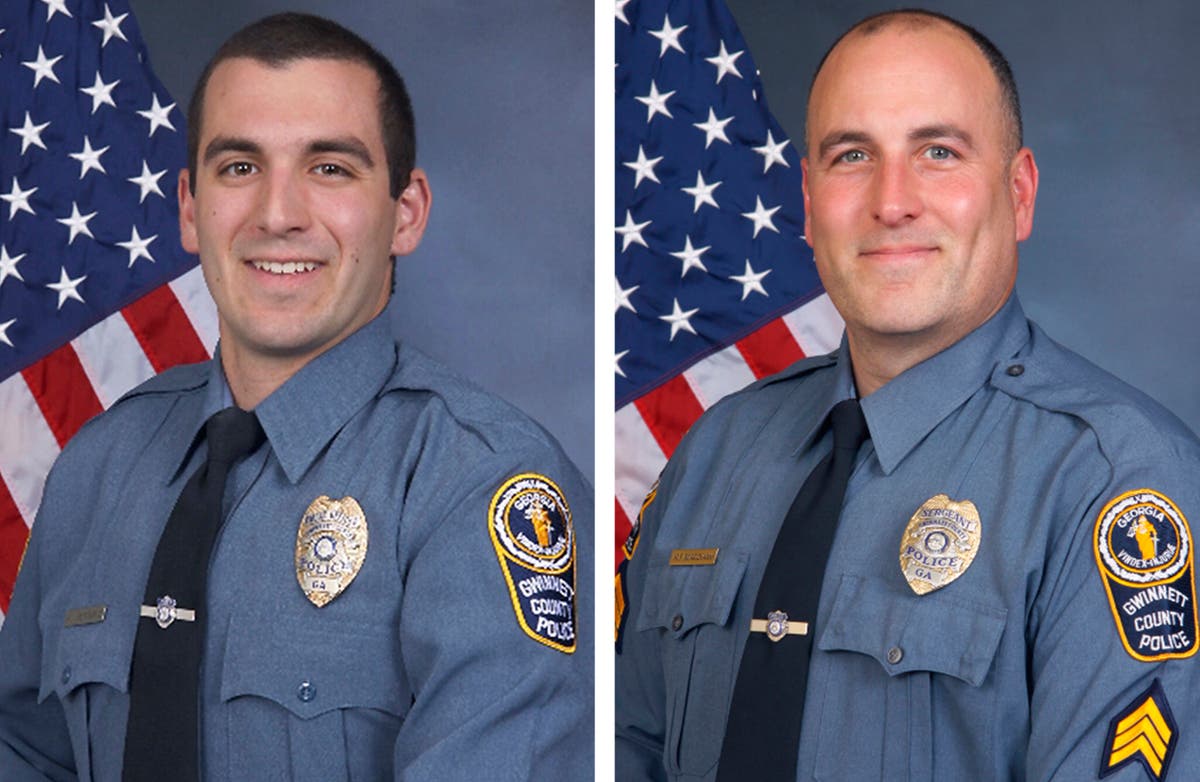 Man who was punched, kicked by Georgia officers settles suit