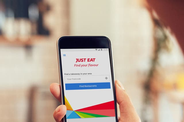 Just Eat Takeaway.com said its total orders surged to 1.1 billion last year (PA)
