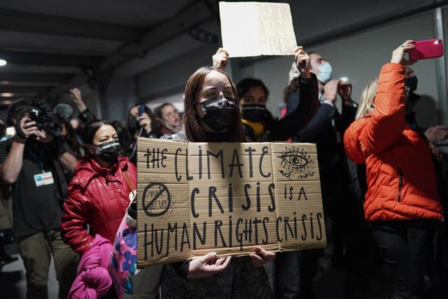 <p>Climate change protesters at Cop26 in Glasgow last year </p>