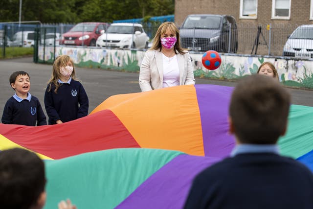 Education Minister Michelle McIlveen, centre, has come under pressure over her handling of the pandemic in schools (Liam McBurney/PA)