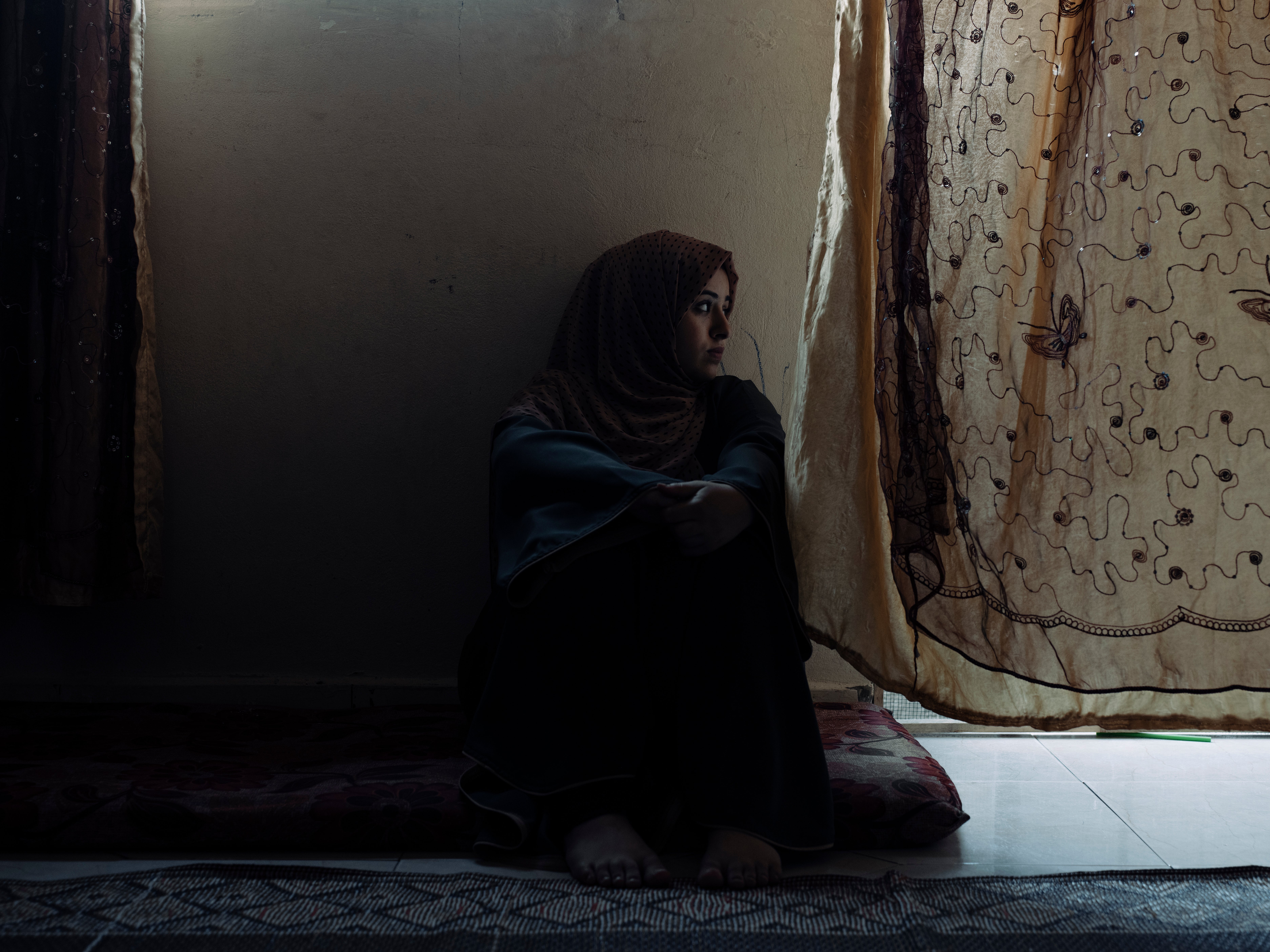 Nooha, 19, remembers the day her father was killed in 2014 by air strikes while on his way to buy food for the family, in the residential area of Fallujah