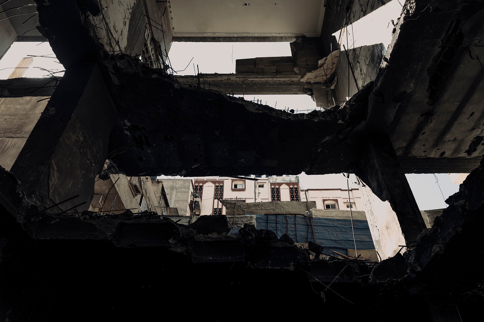 The scale of damage inflicted during May’s 10-day conflict seen clearly from the basement car park of a tower block in Gaza City