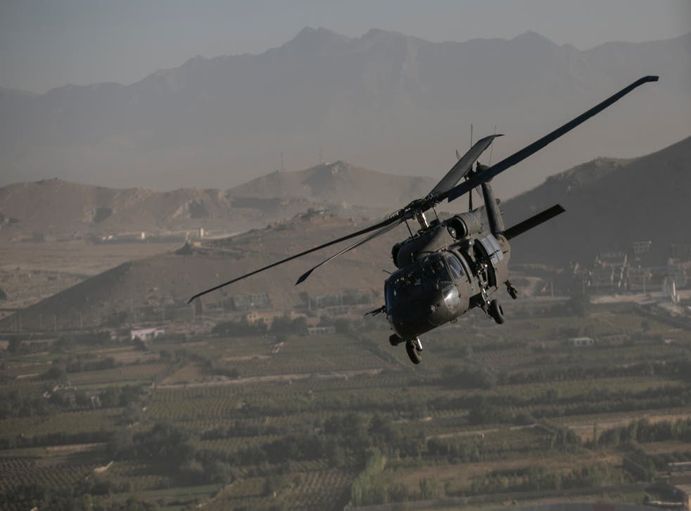 A Black Hawk helicopter over Kabul (Dan Kitwood/PA)