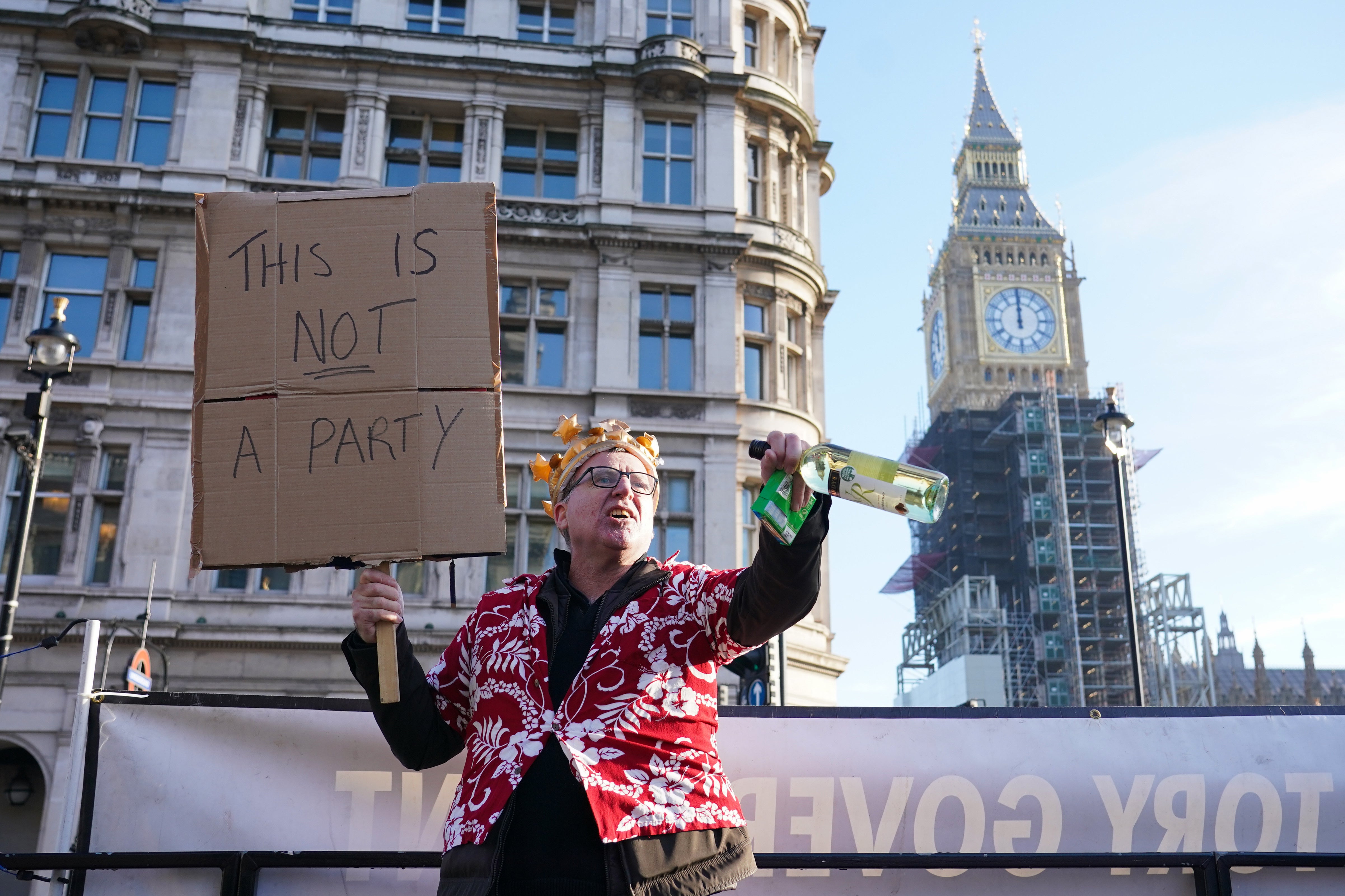 A protester in Parliament Square in Westminster (Dominic Lipinski/PA Wire)