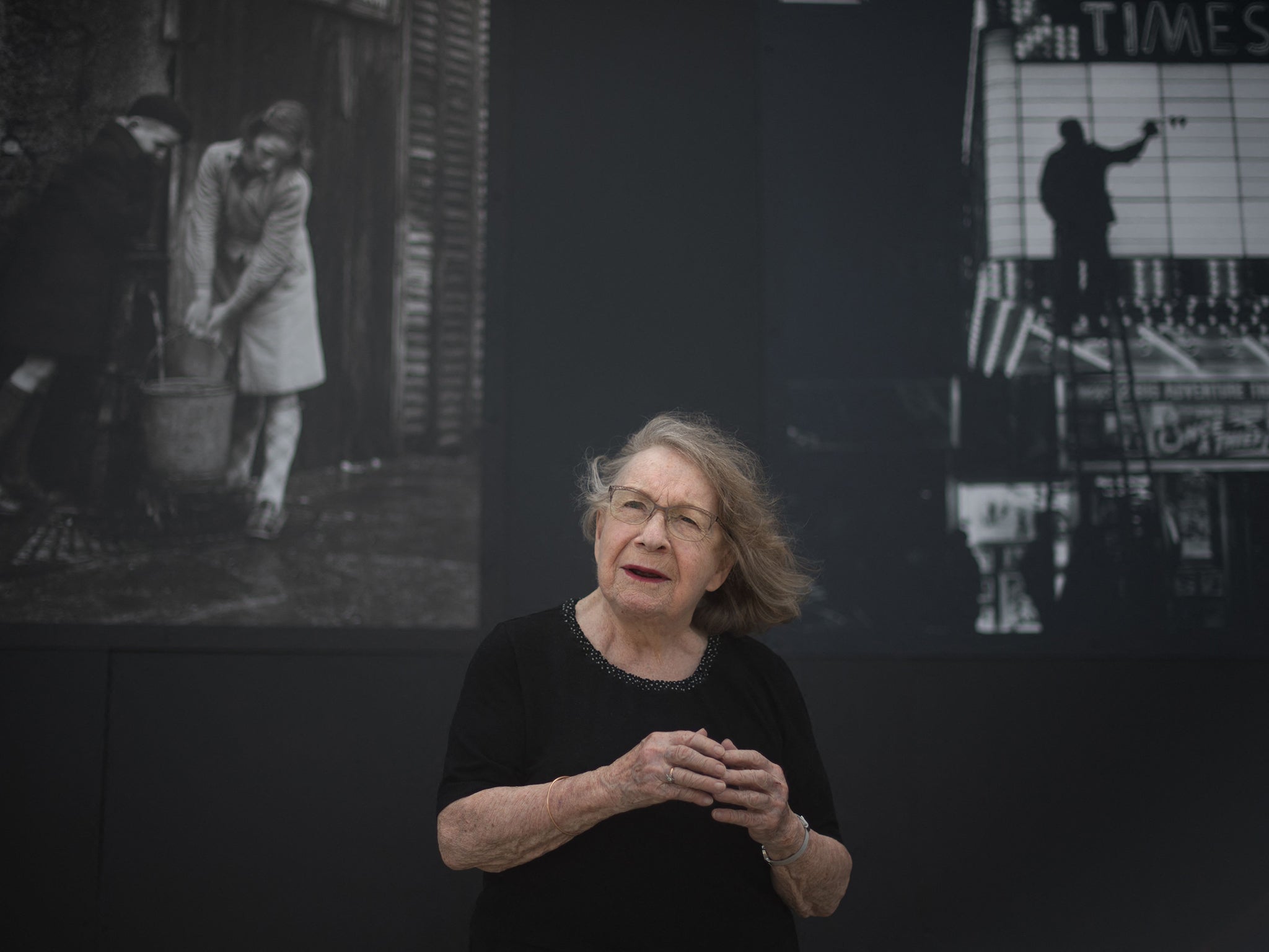 Weiss at a 2020 exhibition of her photographs