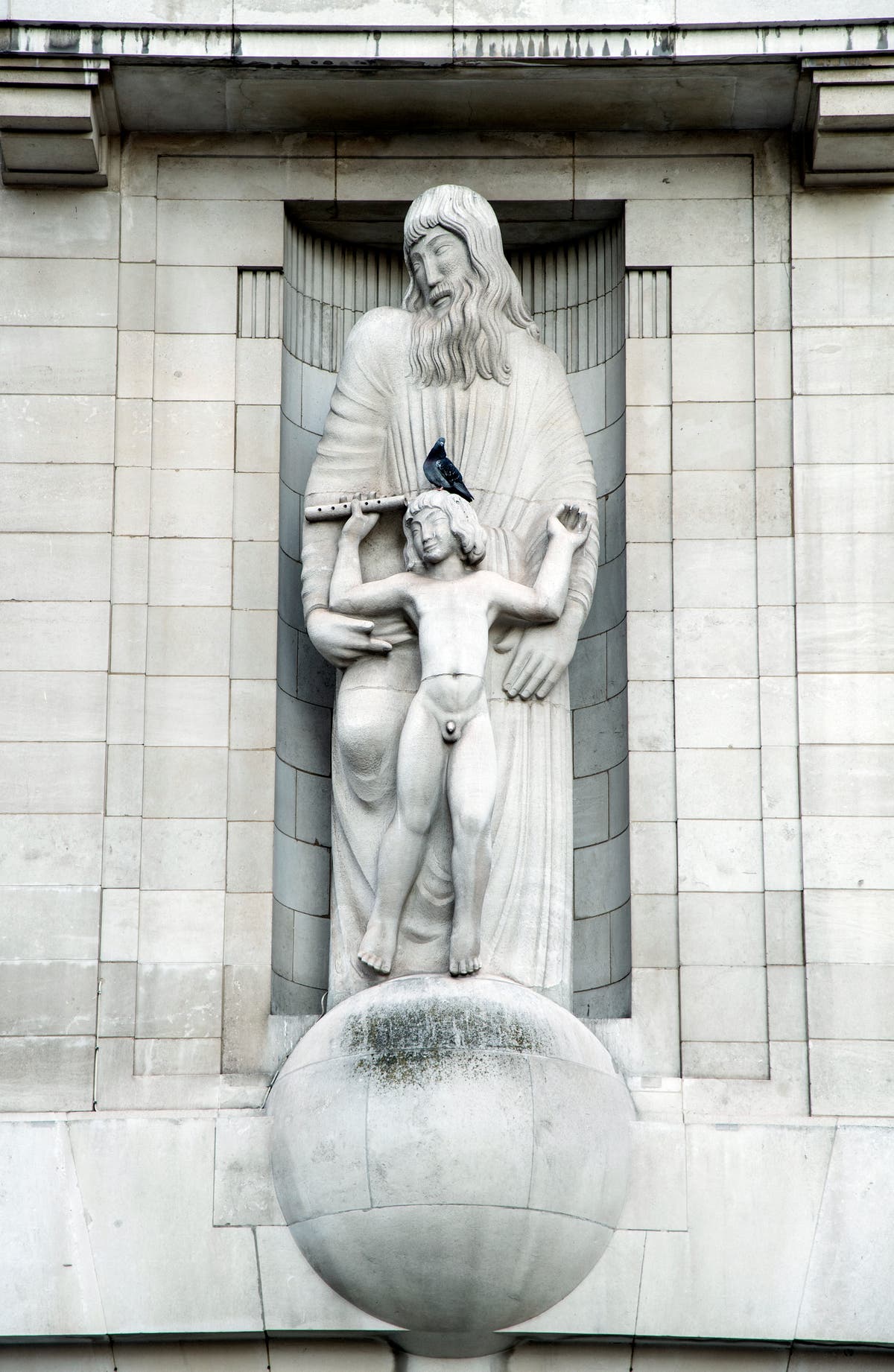 Man uses hammer on statue on BBC headquarters
