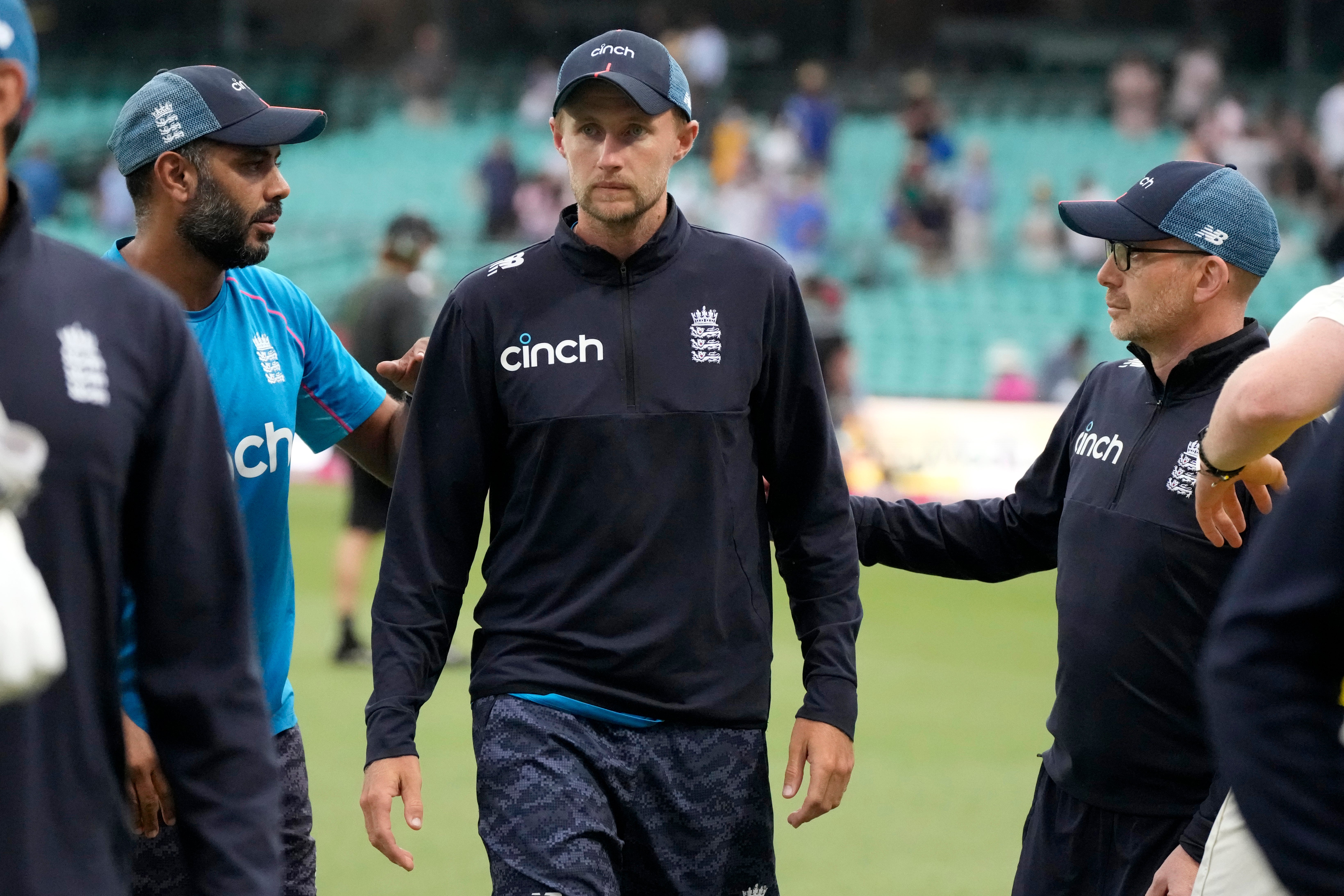 Joe Root, centre, led his team to a hard-earned draw in Sydney (Rick Rycroft/AP)