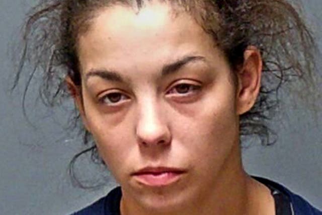 <p>This booking photograph provided by the N.H. Attorney General's office shows Kayla Montgomery, 31, of Manchester, New Hampshire, who was arrested on January 5, 2022</p>