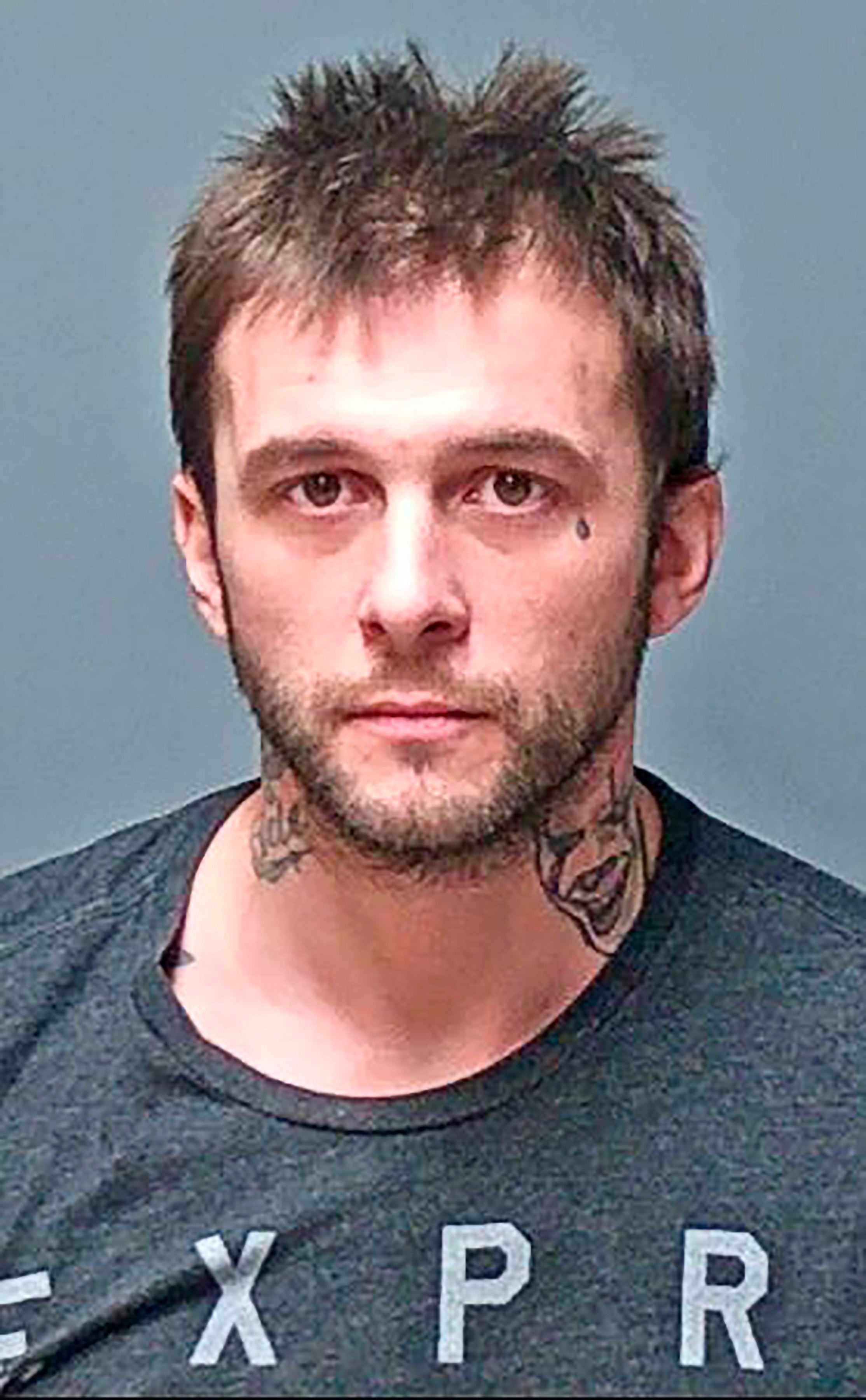 Adam Montgomery is pictured in booking photo following arrest