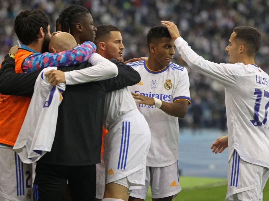 Real Madrid celebrate winning the Super Cup semi-final