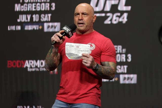 <p>FC commentator Joe Rogan announces the fighters during a ceremonial weigh in for UFC 264 at T-Mobile Arena on July 09, 2021 in Las Vegas, Nevada. </p>