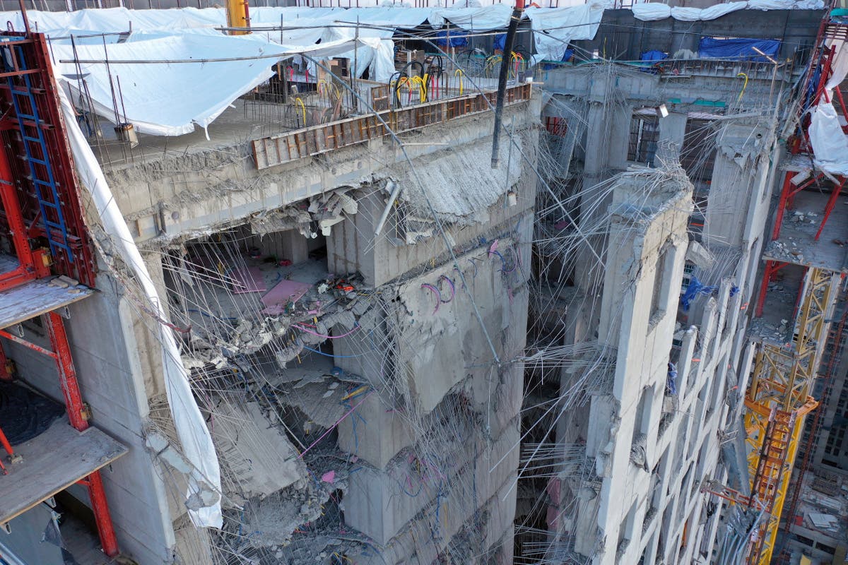 SKorean rescuers locate man at collapsed construction site 