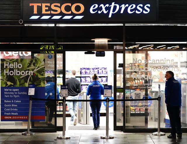 Supermarket giant Tesco has become the latest retailer to upgrade its annual outlook (Jonathan Brady/PA)