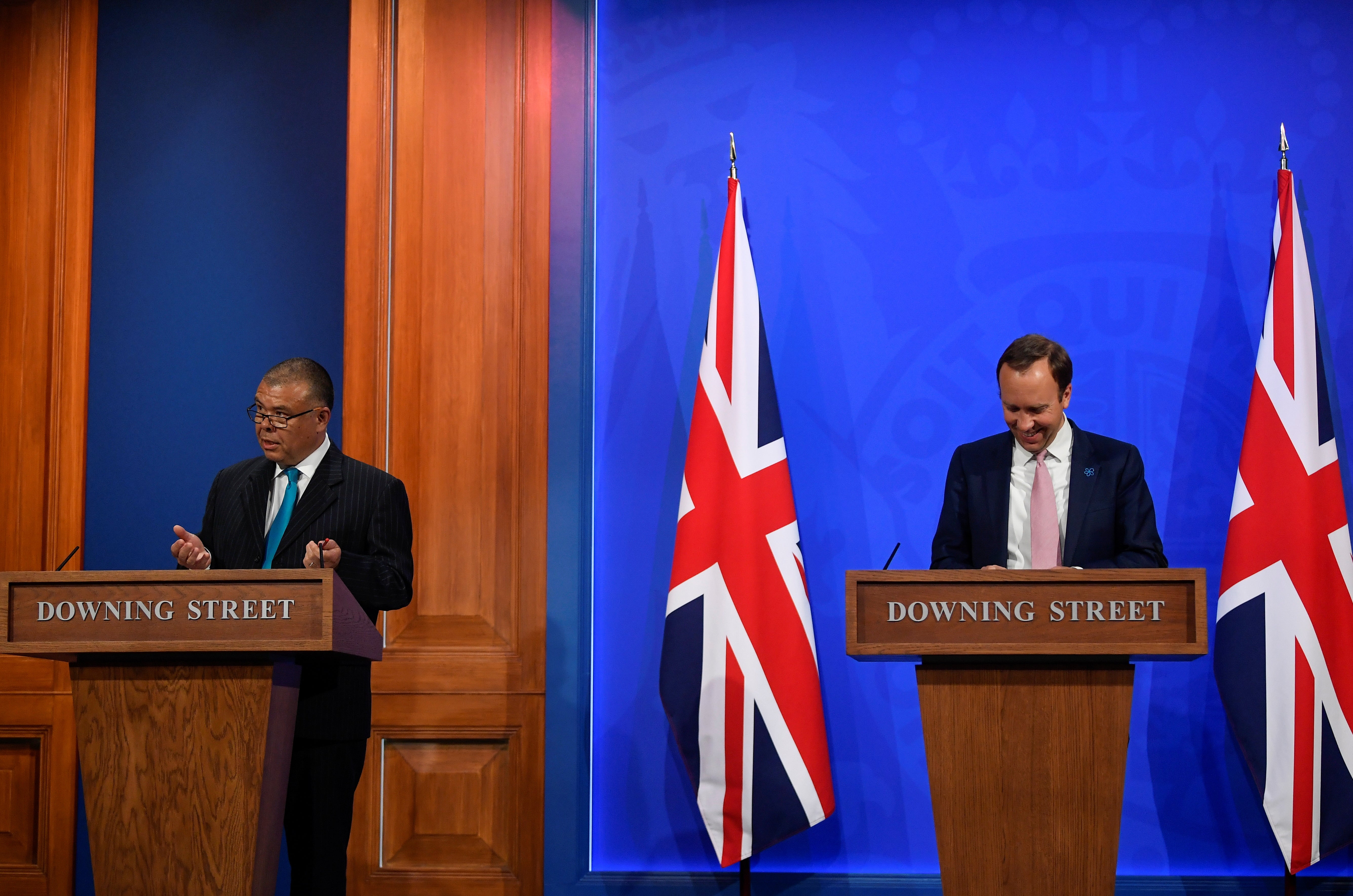 Sir Jonathan, left, became well-known for using light-hearted analogies to explain complex scientific issues at Covid briefings (Toby Melville/PA)