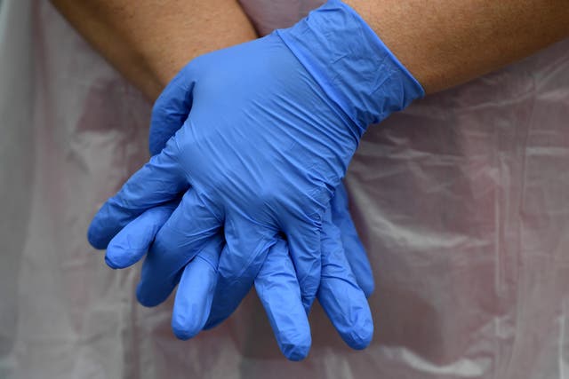 PPE will be available until March 31 2023 or until infection prevention control guidance is “withdrawn or significantly amended”, the Department for Health and Social Care (DHSC) said (PA)