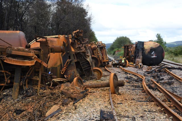 A freight train derailment which caused a huge fire and threatened an environmental disaster happened because of a brake defect, an investigation has found (RAIB/PA)