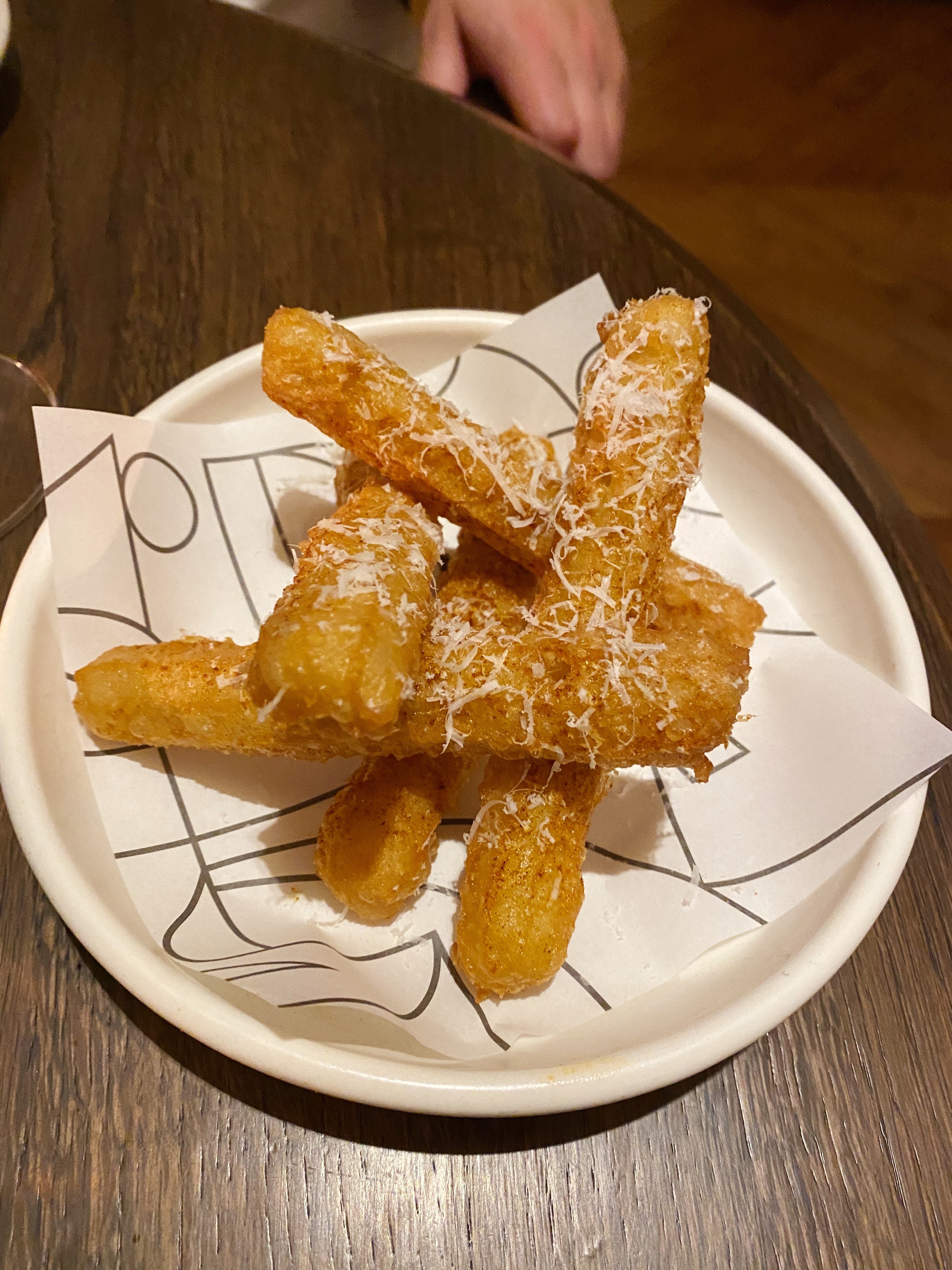 Parmesan fries straddled the line between churro and molten cheese heaven