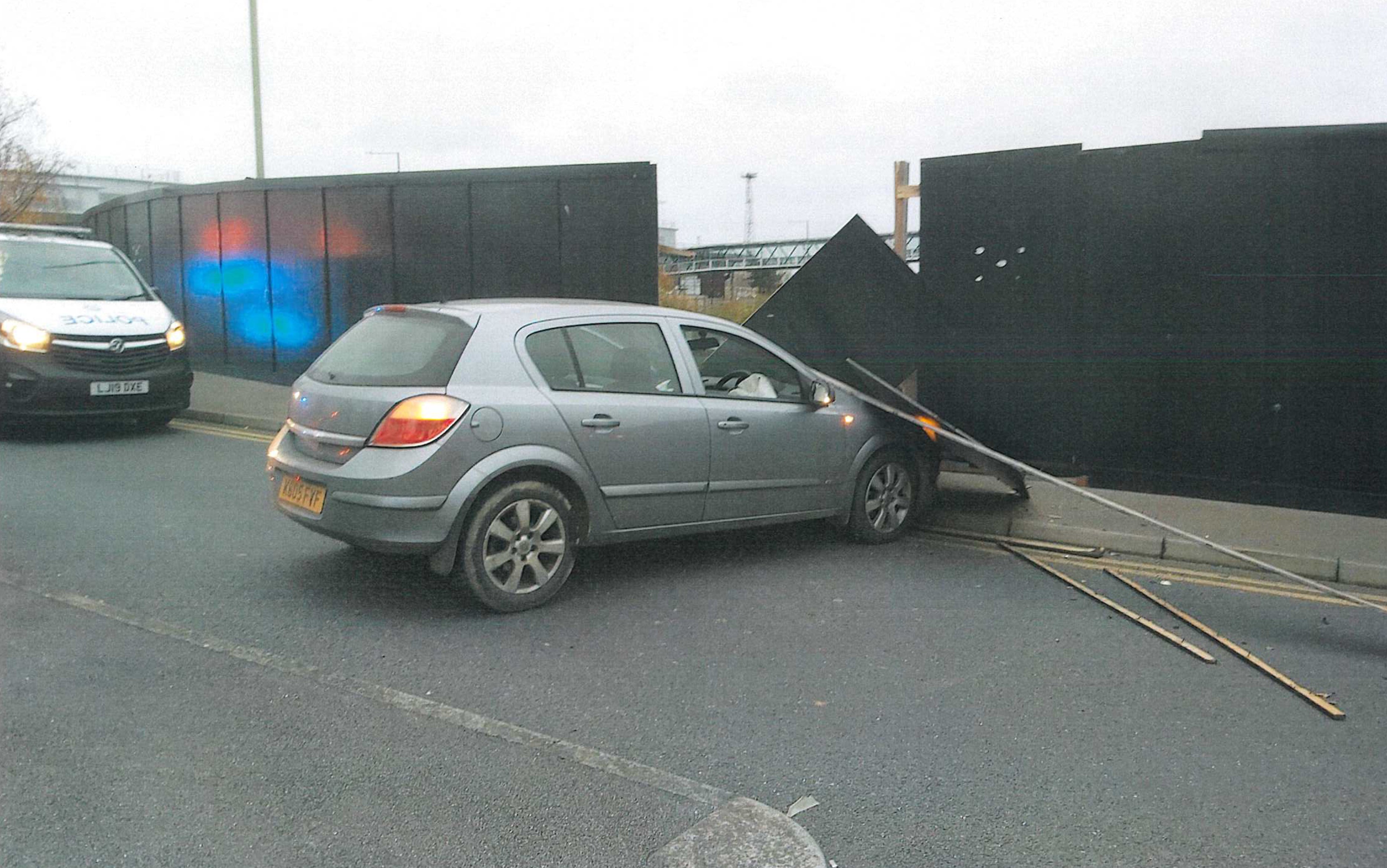 The car crashed into a fence, narrowly missing a family (CPS/PA)