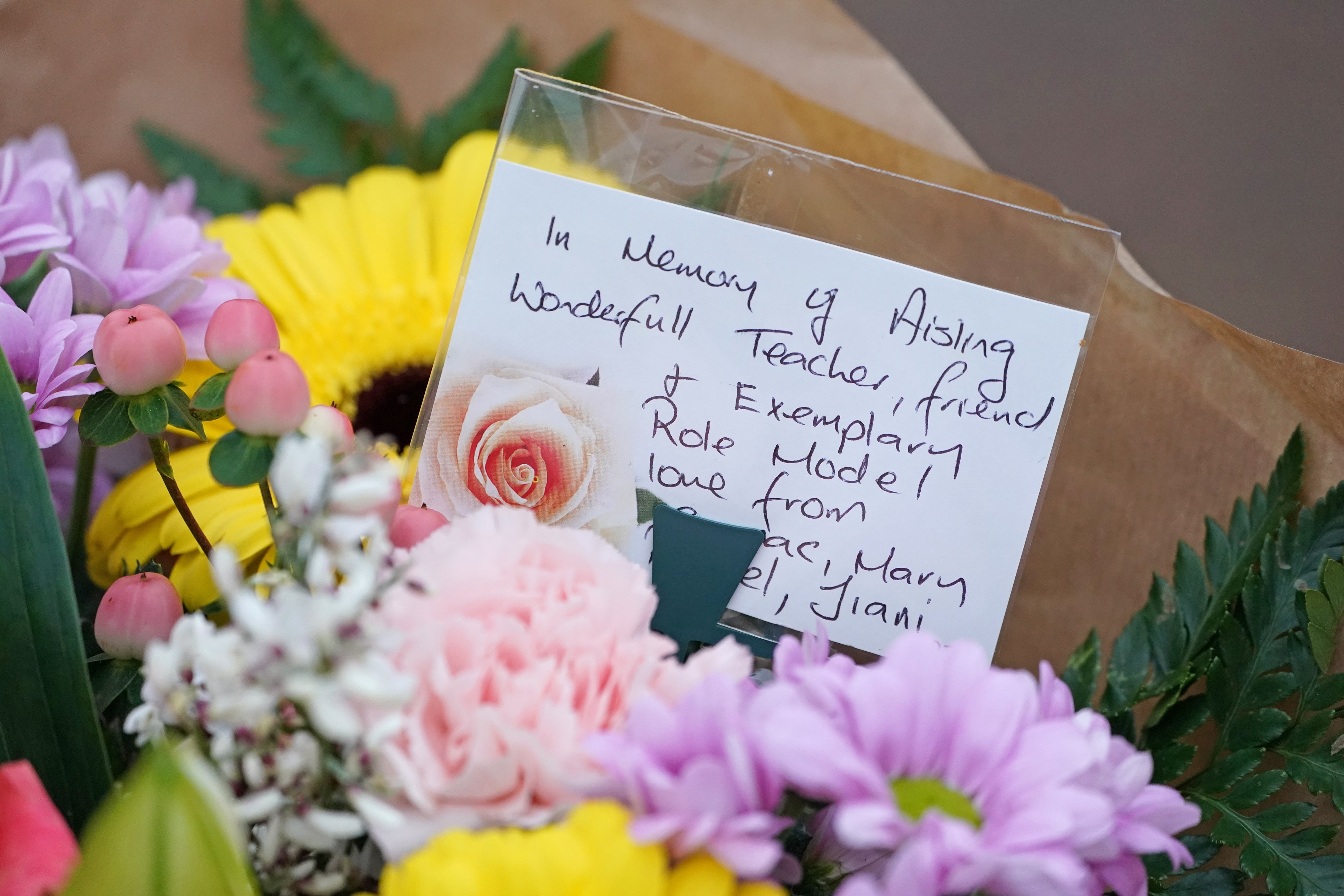 Flowers and messages are left in Tullamore, Co Offaly (Brian Lawless/PA)