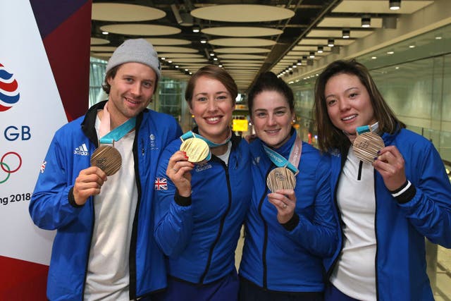<p>Billy Morgan, Lizzy Yarnold, Laura Deas and Isabel Atkin of Great Britain pose with their Olympic medals in 2018</p>