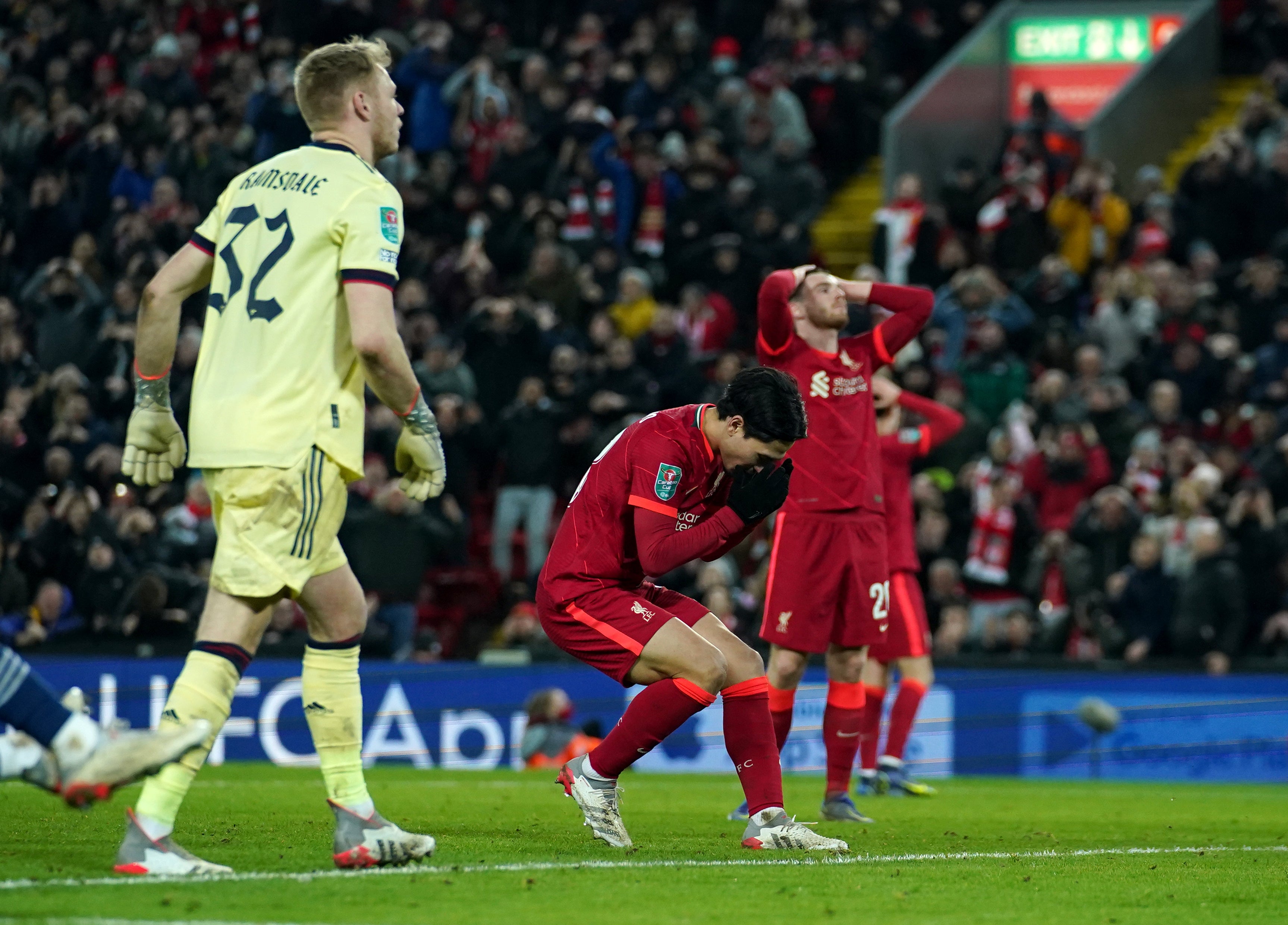 Takumi Minamino, centre, missed Liverpool’s best chance late on (Peter Byrne/PA)