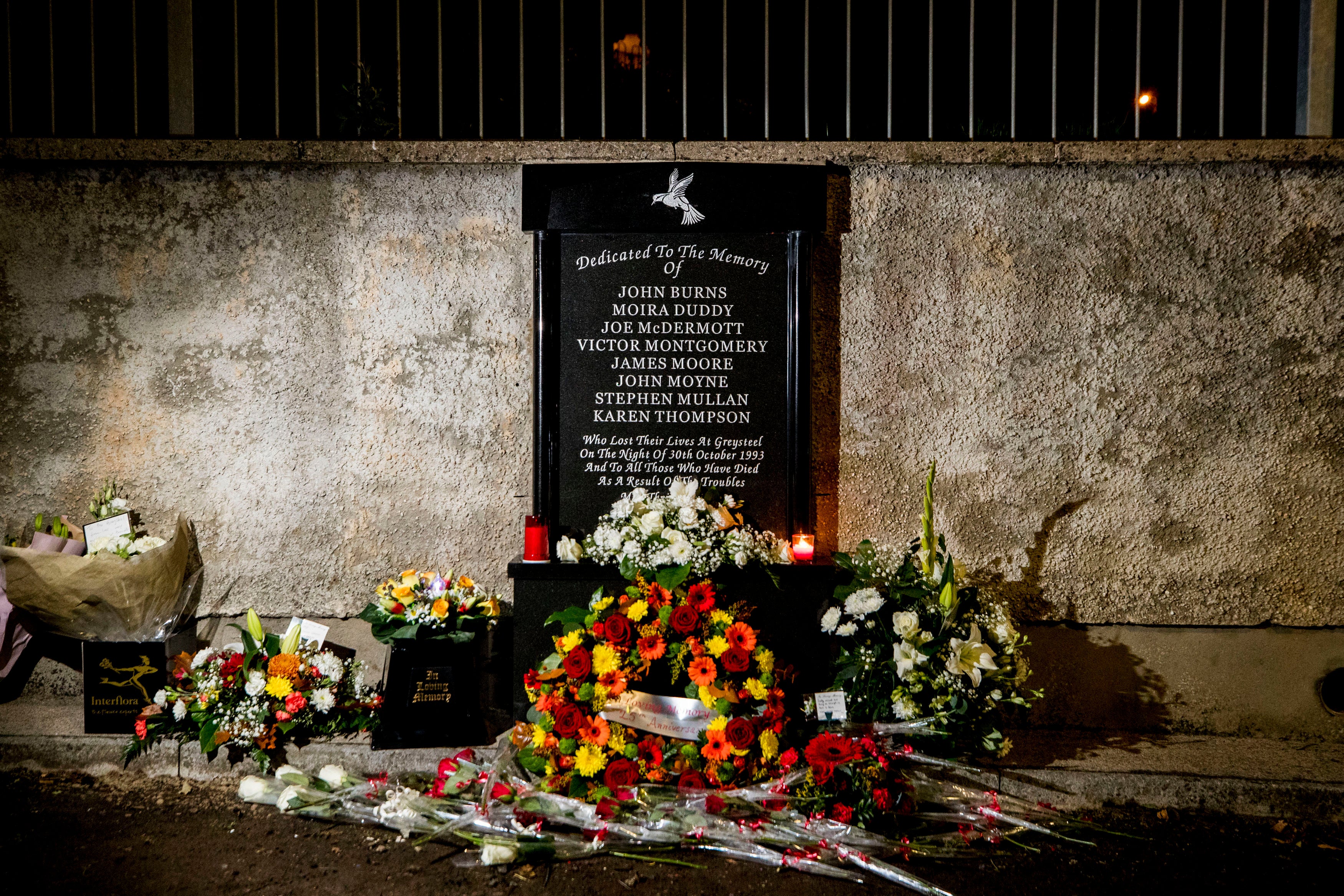 Flowers at the memorial site of the Greysteel massacre (Liam McBurney/PA