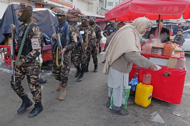 <p>Taliban security officials patrol in Kabul</p>