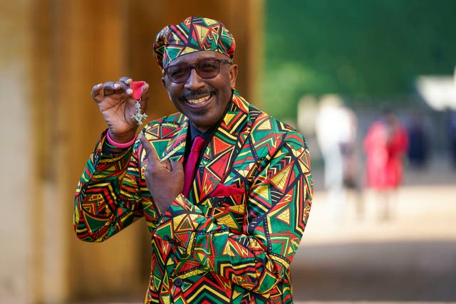 Fitness guru Derrick Evans after receiving an MBE during an investiture ceremony at Windsor Castle