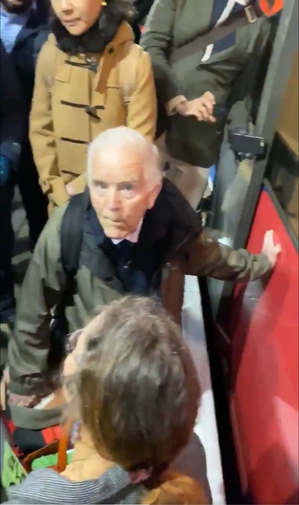 Extinction Rebellion protester Phil Kingston who has glued himself to a DLR train at Shadwell in east London (Max Kara/Twitter/PA)