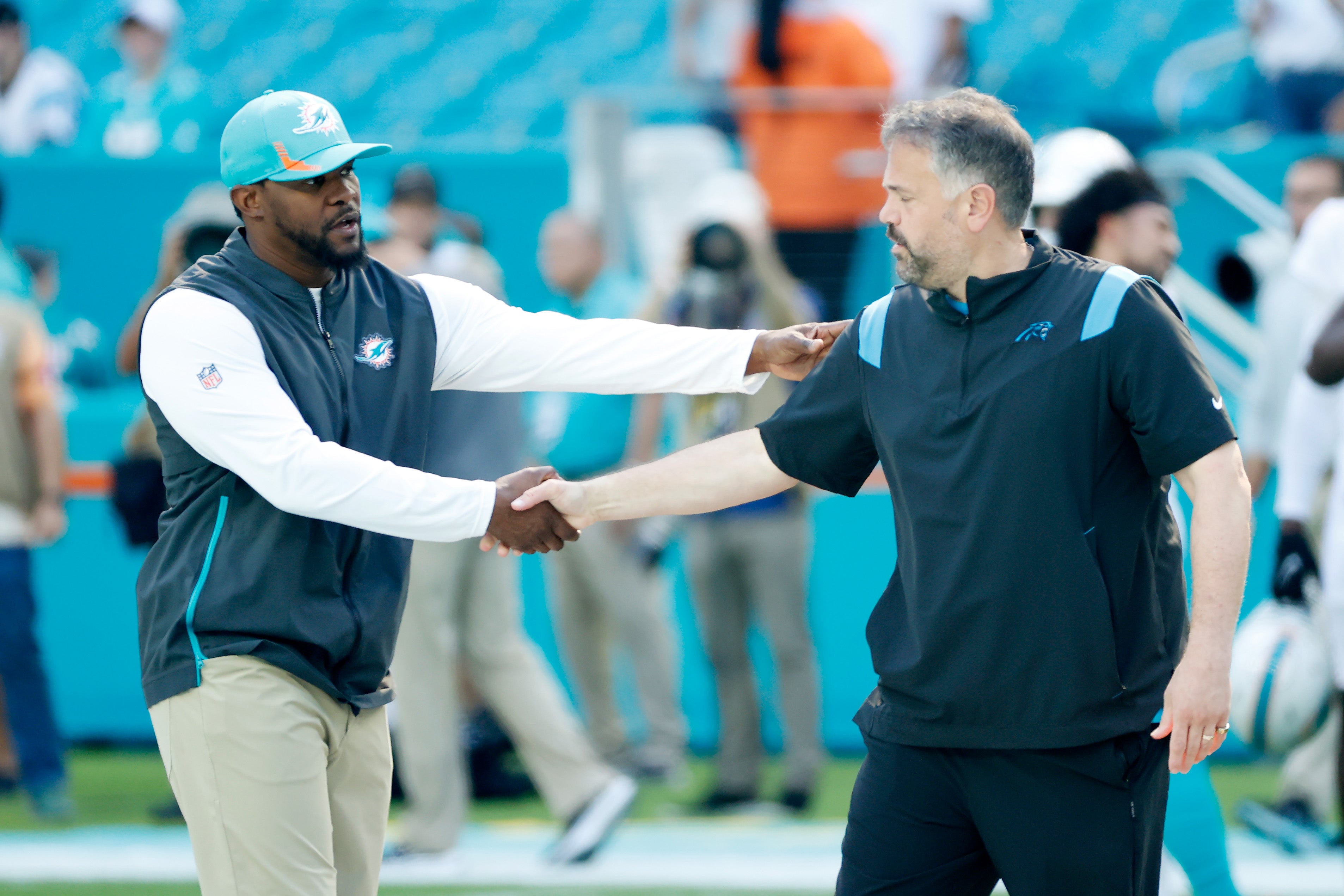 Brian Flores was fired by the Miami Dolphins, while Matt Rhule survived as head coach of the Carolina Panthers