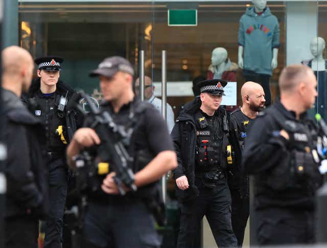 Armed police outside the Arndale Centre in Manchester following the incident (Peter Byrne/PA)