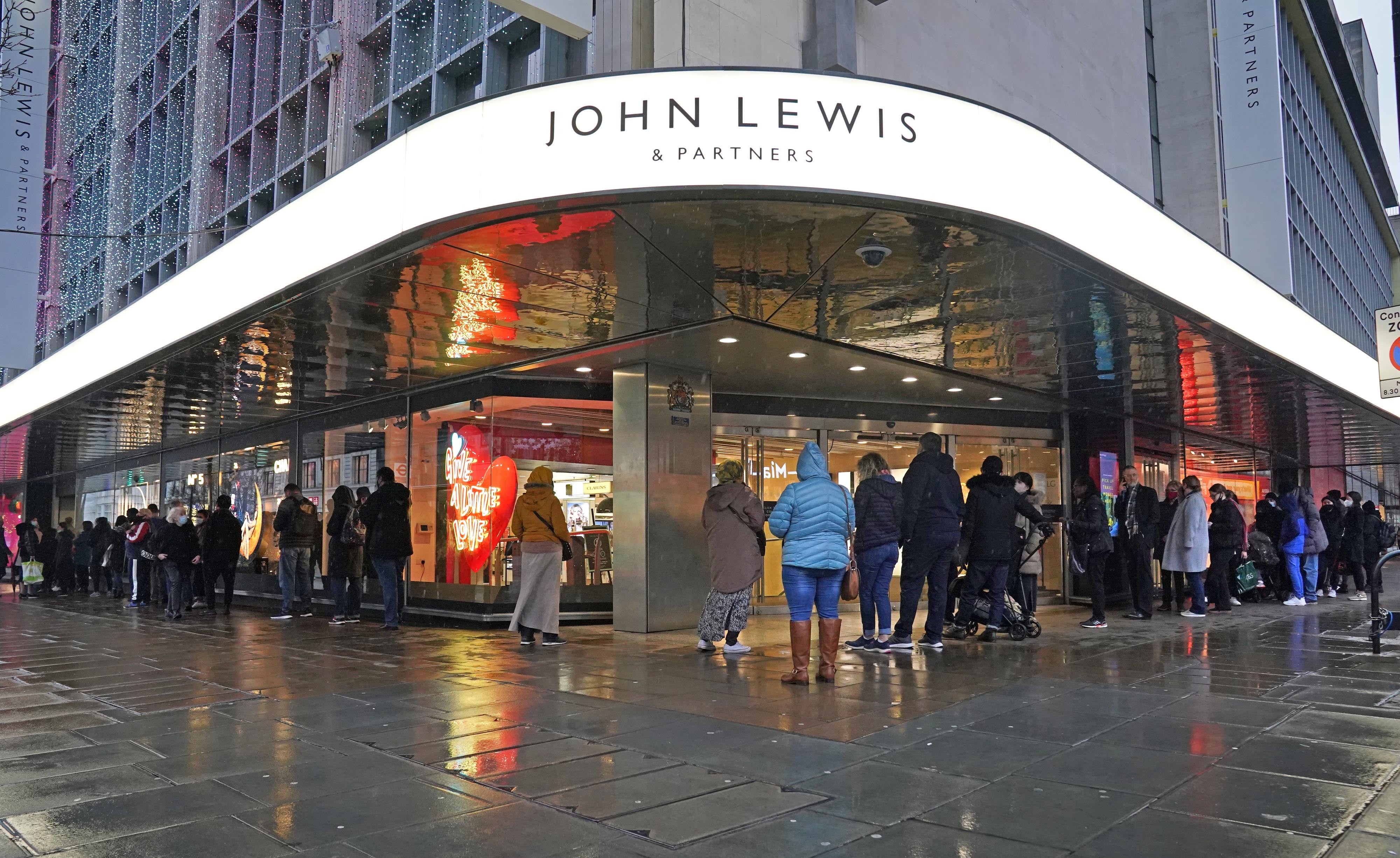 People queuing outside John Lewis on Oxford Street in London on December 27 (Jonathan Brady/PA)