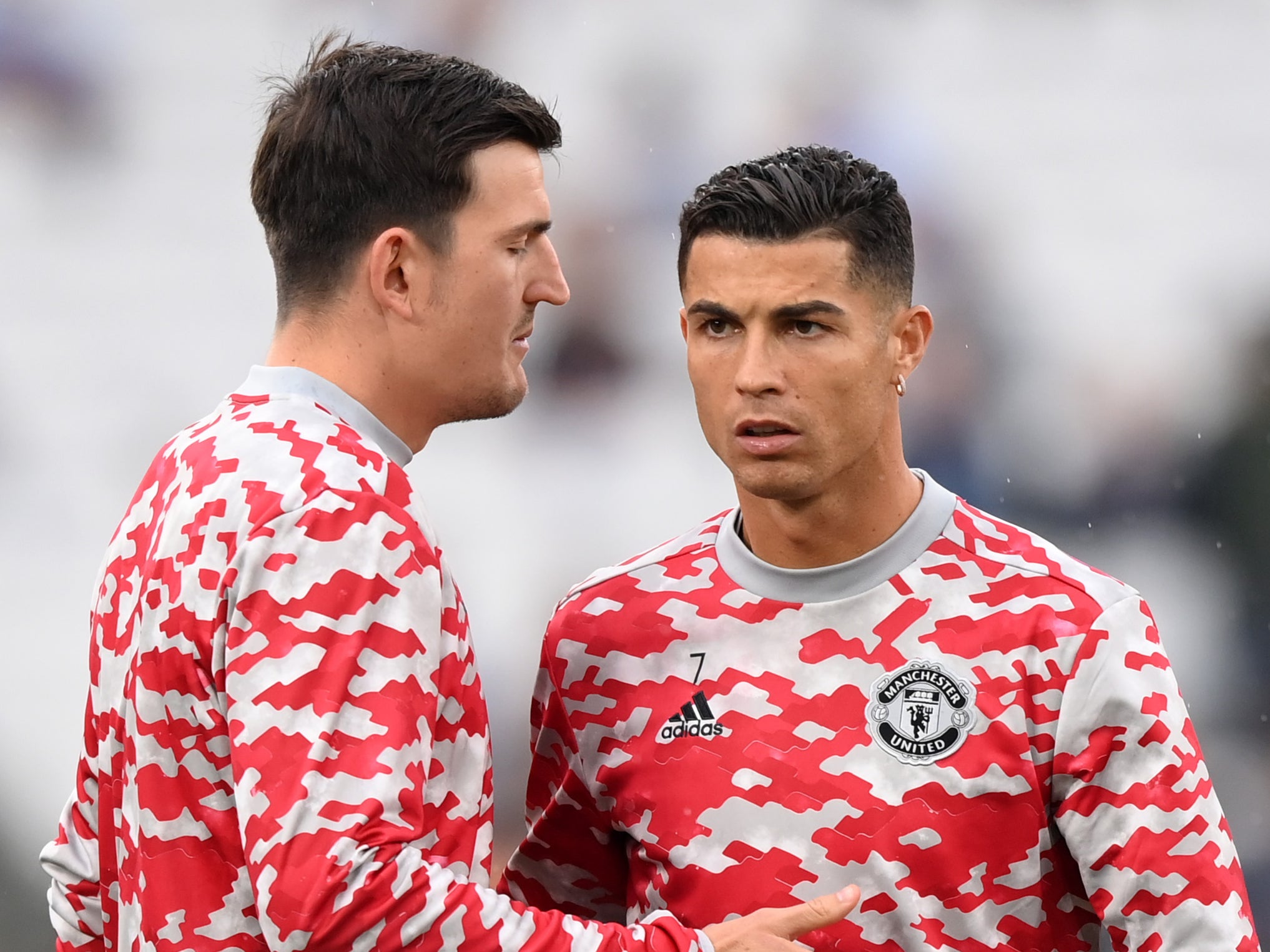 Manchester United captain Harry Maguire with Cristiano Ronaldo
