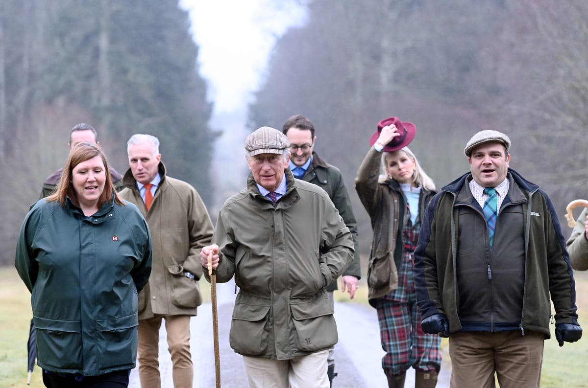 Charles refuses to answer questions on Andrew as he visits storm-hit estate