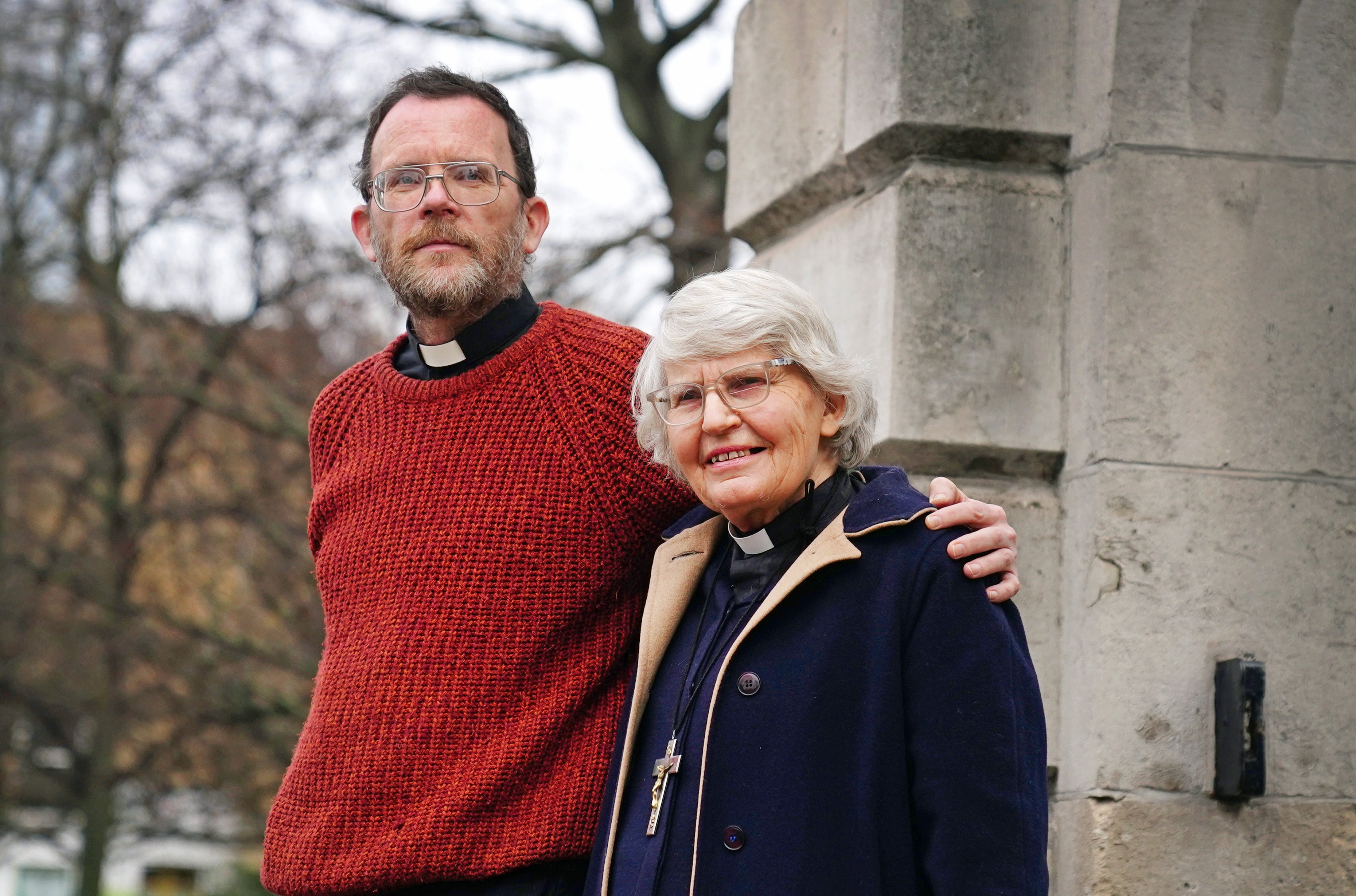 Extinction Rebellion activists Father Martin Newell, 54, and Reverend Sue Parfitt, 79, outside Inner London Crown Court, south east London, where they, and former university lecturer Philip Kingston, 85, have been unanimously acquitted by a jury over a 2019 stunt which saw them cause 77 minutes of disruption to a central London train (PA)