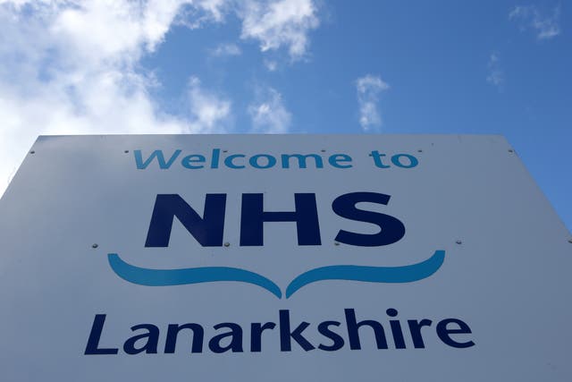 Essential visits have been reintroduced at inpatient services, including all hospitals, in NHS Lanarkshire in a bid to reduce pressures on NHS staff (Andrew Milligan/PA)
