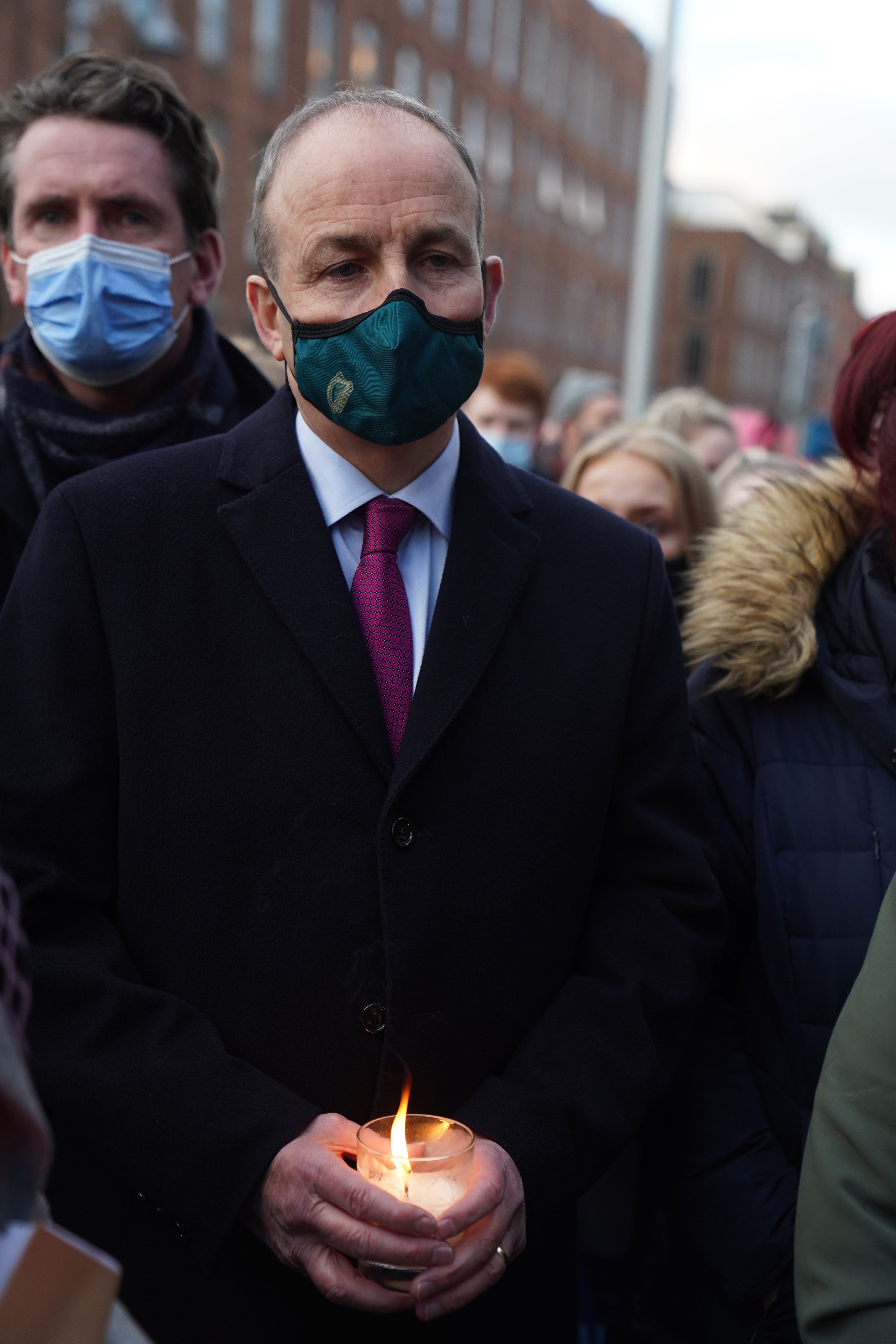 Taoiseach Micheal Martin attends the vigil at Leinster House, Dublin (Brian Lawless/PA)