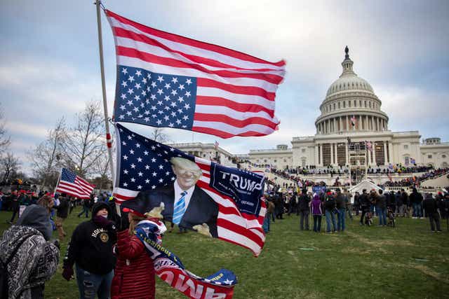 <p>Trump supporter gather in front of the US Capitol building on 6 January 2021 in Washington DC</p>
