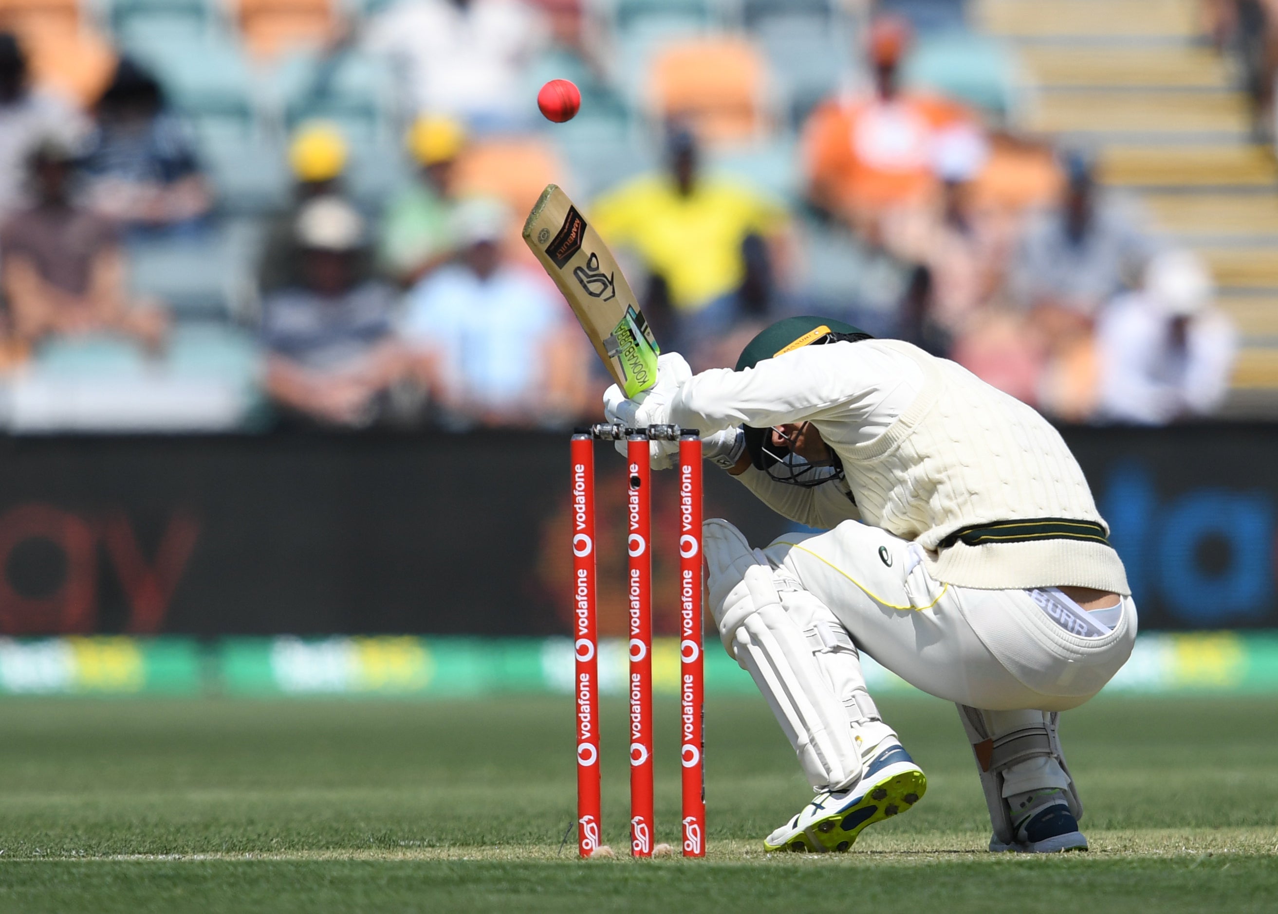 Australia’s Alex Carey ducks under a bouncer bowled by England’s Mark Wood (Darren England via AAP/PA)