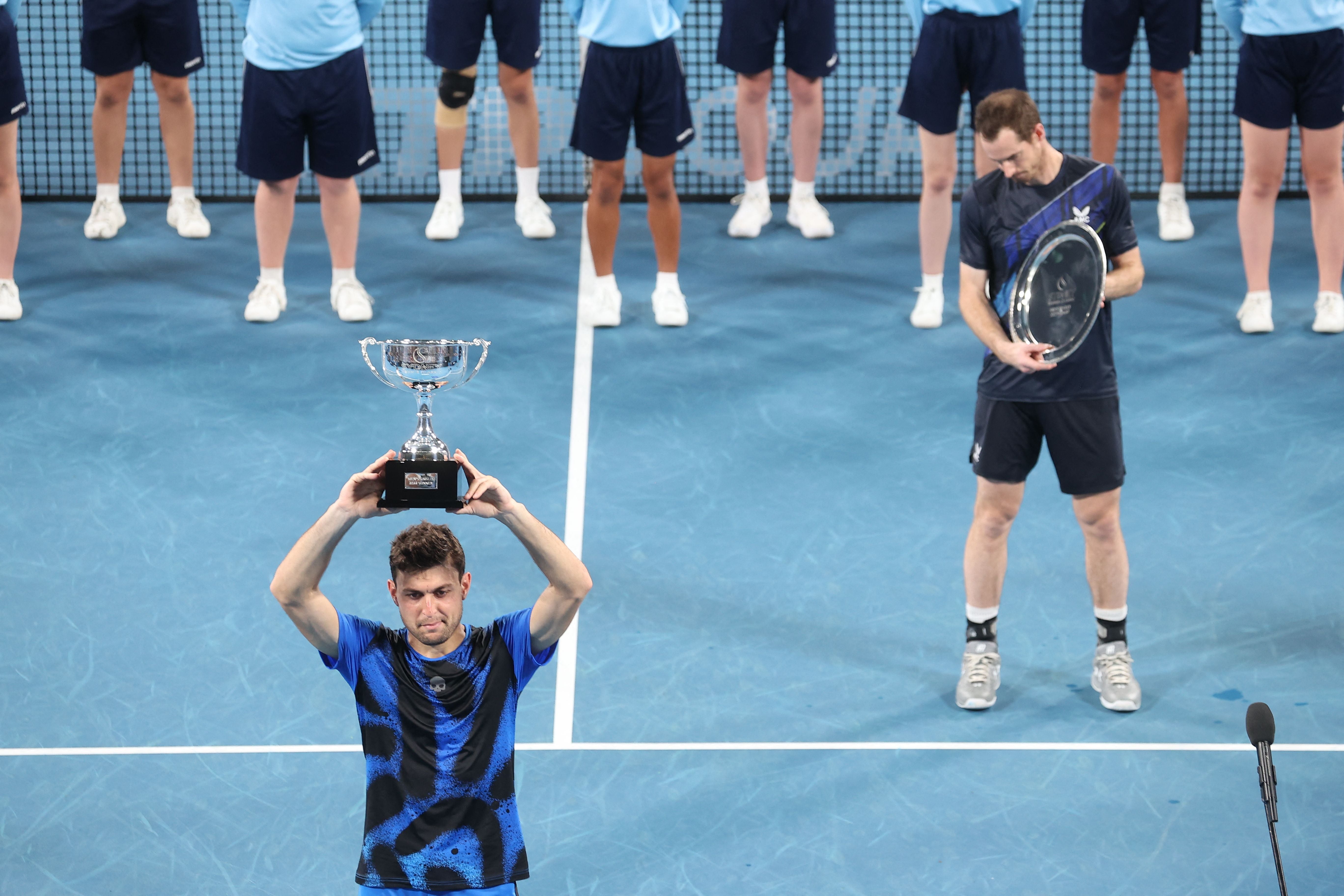 Aslan Karatsev celebrates after beating Andy Murray in the final