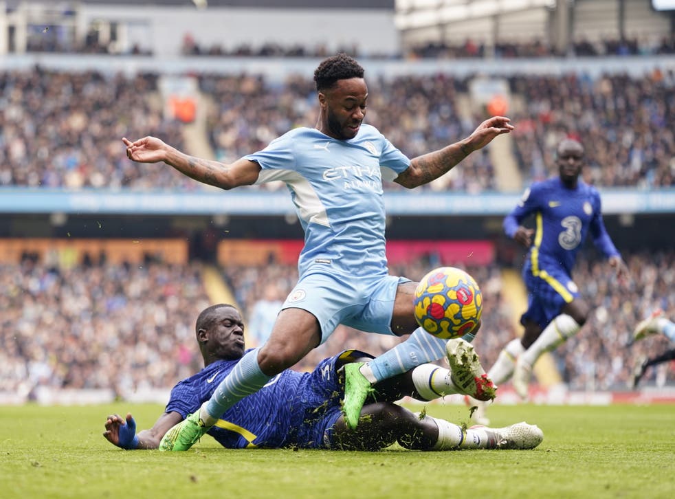 <p>Raheem Sterling is tackled by Malang Sarr</p>