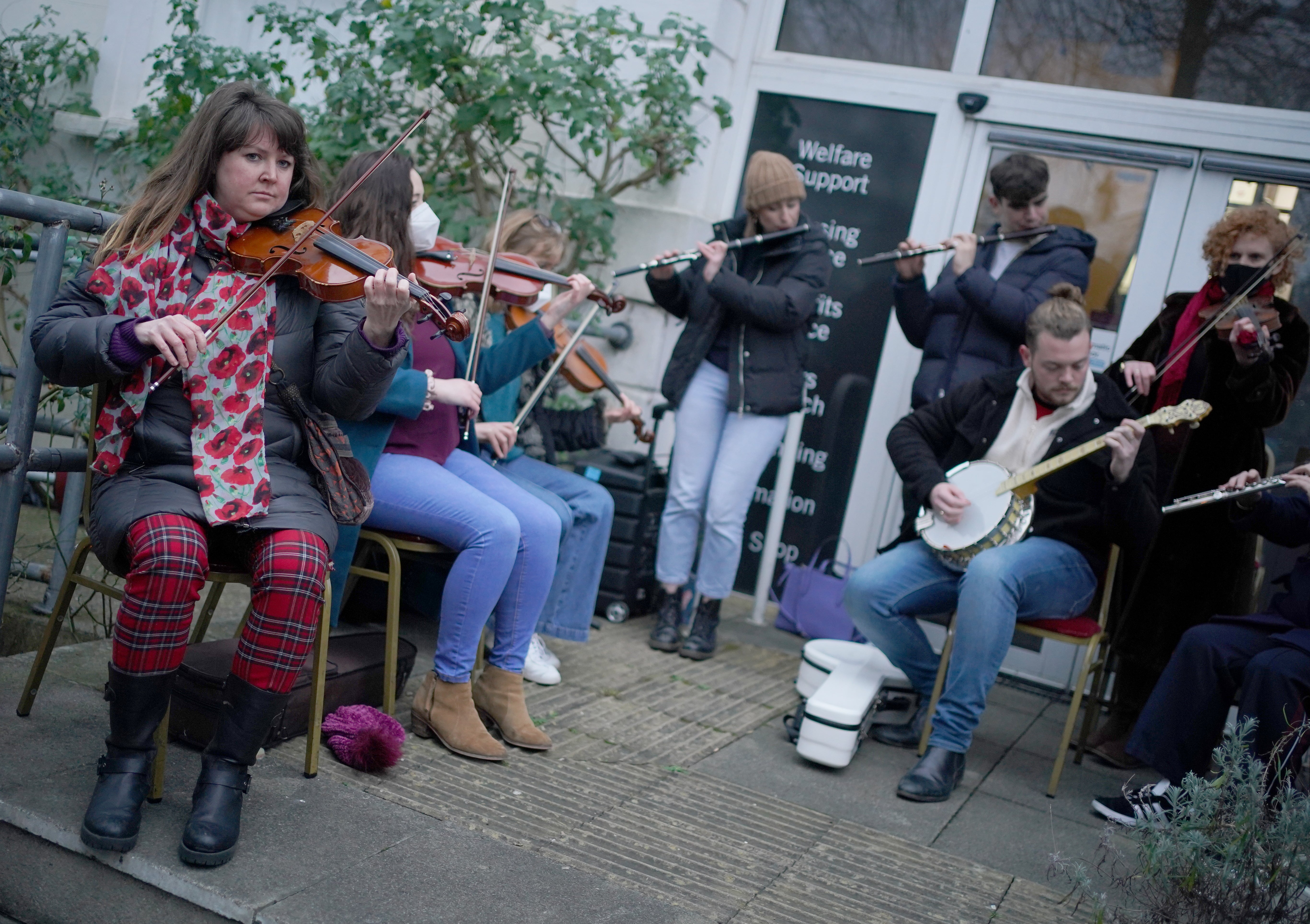 Musicians perform in Ashling Murphy’s honour outside the London Irish Centre in Camden, north London (Dominic Lipinski/PA)